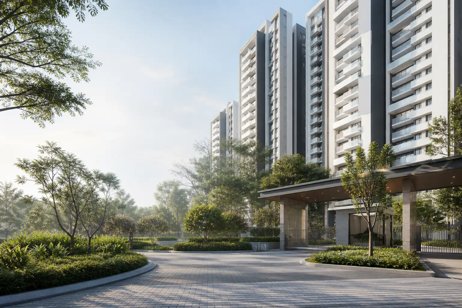 Contemporary white and charcoal apartment towers beside a landscaped arrival court Contemporary white and charcoal apartment towers beside a landscaped arrival court